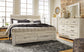 Bellaby  Panel Headboard With Mirrored Dresser, Chest And Nightstand