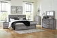 Bronyan King Panel Bed with Mirrored Dresser, Chest and 2 Nightstands